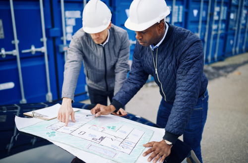 Engineers looking at plans